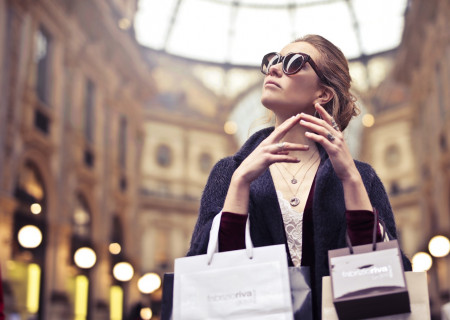 woman-wearing-sunglasses-with-assorted-paper-bags-994234